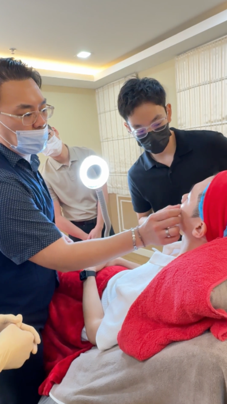 This image shows Dr Tristan guiding local doctors about injection technique for Neauvia Dermal Fillers for maximum result.