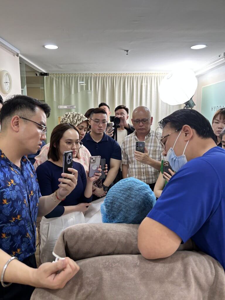 Dr. Wong and Dr. Tristan leading a professional session on wrinkle relaxers and Botox for local aesthetic doctors.