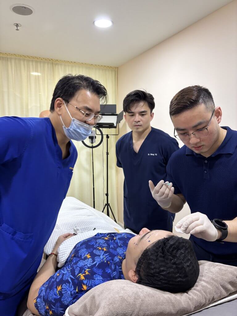 Dr. Wong and Dr. Tristan leading a professional session on wrinkle relaxers and Botox for local aesthetic doctors.