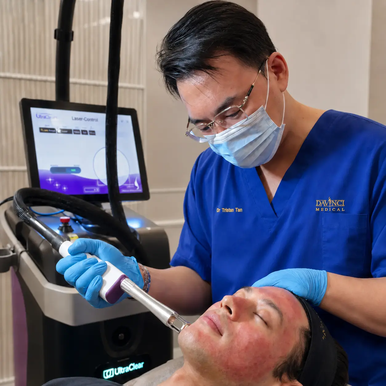 UltraClear Laser handpiece treatment — doctor performing laser resurfacing at Da Vinci Clinic